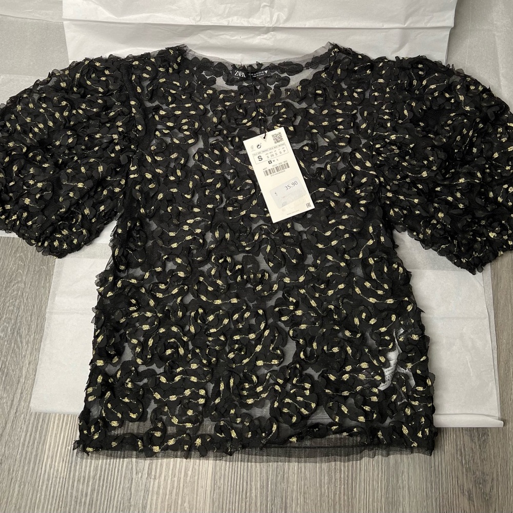 Never worn before back mesh blouse with gold accents! Tag still attached